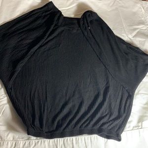 Garage scooped bottom black turtleneck top